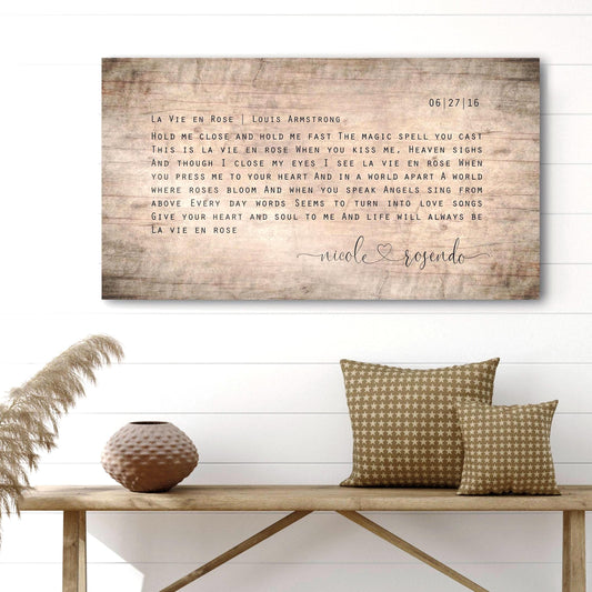 whimsical and romantic first dance lyrics song art, sign with music lyrics, rustic wooden wall decor for couples and wooden song plaque with heart connected names. Personalized and custom made sign hung on wall in aged birch finish.